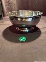 Side view of silver-plated footed bowl