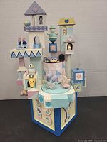 Full view of multi-level pastel castle music box