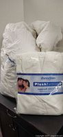 Packaged Daniadown duvet and sealed Plush Bathrobe