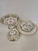 Group shot of all four porcelain pieces