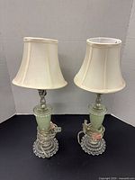 Pair of matching glass lamps with shades