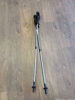Full view of both telescoping walking poles laid out