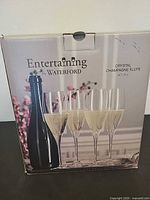 Retail packaging showing Waterford Entertaining crystal champagne flute set