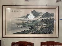 Full view of framed Chinese landscape print on wall