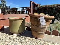 Both planters side by side outdoors