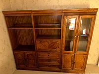 Full view of wall unit showing three connected sections