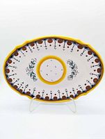 Front view of signed Fratelli Mari Deruta oval ceramic plate