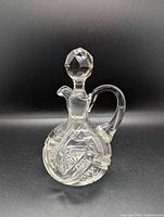 front view of crystal cruet decanter with stopper in place