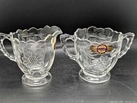 Both crystal pieces front view showing cornflower pattern and label