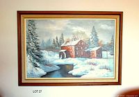 Full view of framed winter mill painting on wall