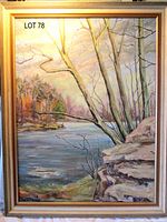 Full view of framed lake landscape painting