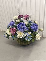 Full view of ceramic vase holding flower arrangement