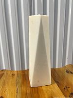 Off-white geometric pillar candle front view