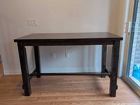 Front view of solid wood rectangular table