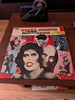 Front sleeve showing title graphics and collage artwork