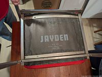 Underside showing Jayden branding and steel frame