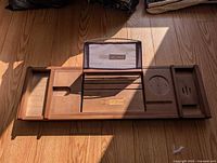 Front view of wooden caddy showing compartments and Vivohome logo