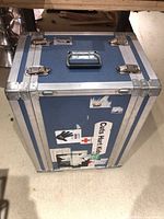 Front view of blue Clydesdale road case with stickers