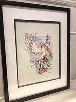 Full view of framed Indigenous art print in black frame