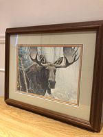 Full view of framed Robert Bateman Bull Moose print