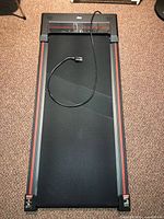 Full view of Sperax walking treadmill showing walking belt and power cord