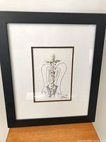 Full view of framed Michael Close watercolour