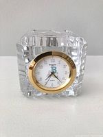 Front view of Waterford crystal cube clock, clear cut facets, white dial with ABC letters