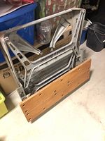 Folded Workmate bench showing full frame and wood panels