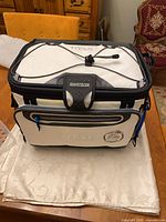 Front view of Titan cooler showing exterior design and branding