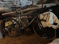 Marin road bike side view among stored items