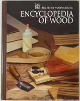 Front cover showing title, brand and woodworking imagery