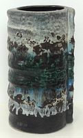 Full view of textured cylindrical Dumler & Breiden Relief vase showing glaze colors and ridge