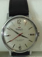 Front view of Waltham watch showing dial details