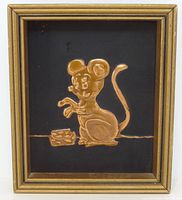 Front view of copper mouse relief in frame