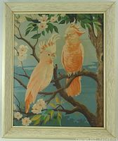 Full view of framed paint-by-number showing two pink cockatoos, frame visible