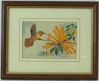 Framed woven silk picture showing hummingbird and flower
