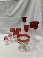 Group shot of all ten ruby red flashed glass pieces