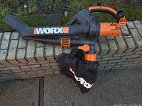 Full view of WORX TriVac blower-mulcher-vacuum with bag attached