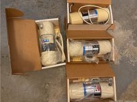 four boxed NSA countertop purifier units, three model 50C and one model 144DW
