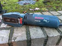 Left side view of Bosch 1640VS Fine Cut handsaw showing metal blade clamp and body