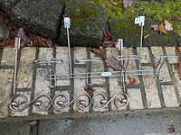 Both over-door racks side by side showing design and hooks