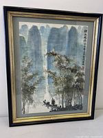 Full view of framed watercolor landscape