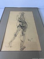 Full view of framed nude sketch showing entire artwork, mat, and frame
