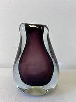 Front view showing teardrop shape and amethyst core