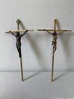 Front view of both crucifixes hanging side by side