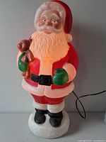 Front view lit showing Santa figure and illumination