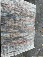 Full view of rug laid flat showing pattern and size