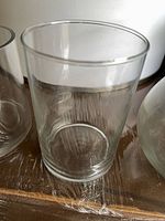 Front view of clear cylindrical glass vase