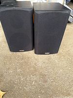 Front view of both Paradigm bookshelf speakers with grilles on