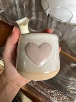 Front view showing heart motif and finish